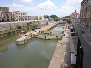See boat, lock starts to open.